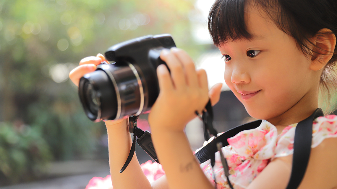 Child taking a photo