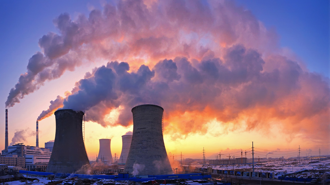 Chimneys from a factory producing a lot of smoke. 