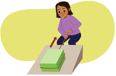 A learner pulling a weight wrapped with a rope up an inclined plane towards herself. An arrow pointing up shows the direction of movement.