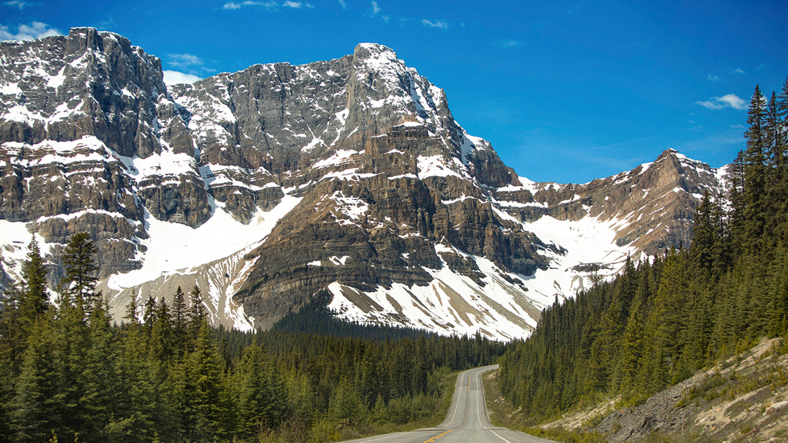 A road going through a mountain range.
