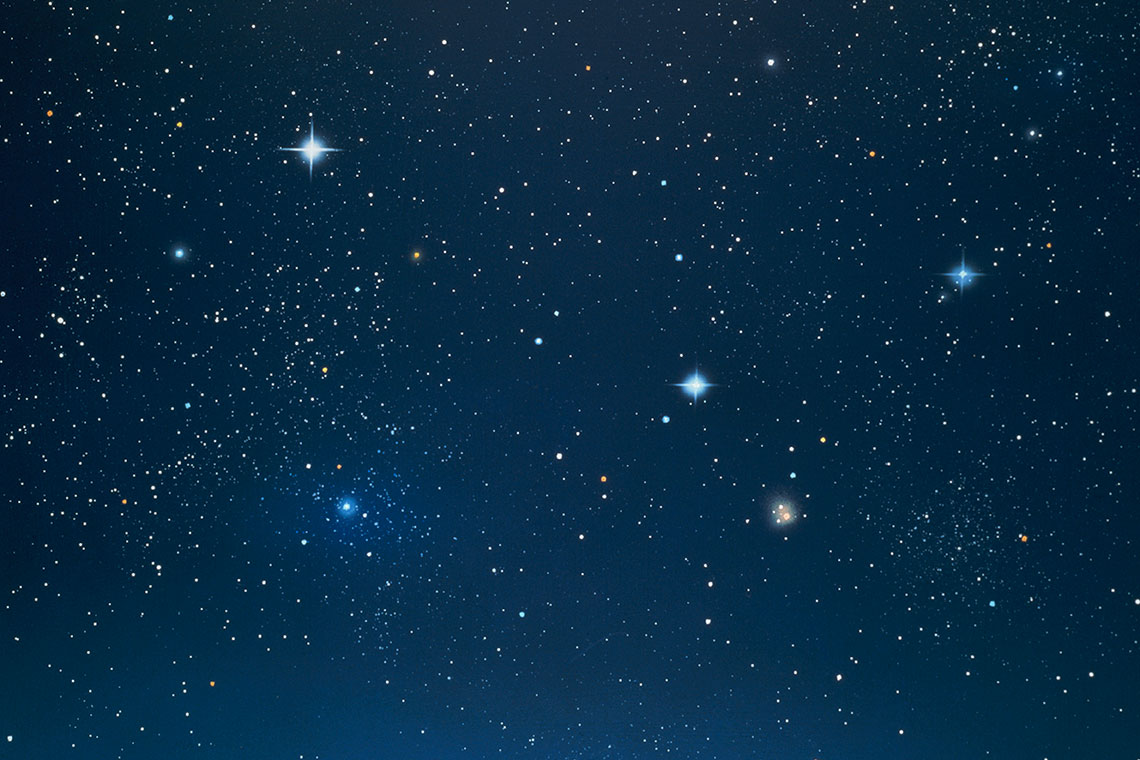 Stars shining in the night sky. Some stars are shining brighter than others.