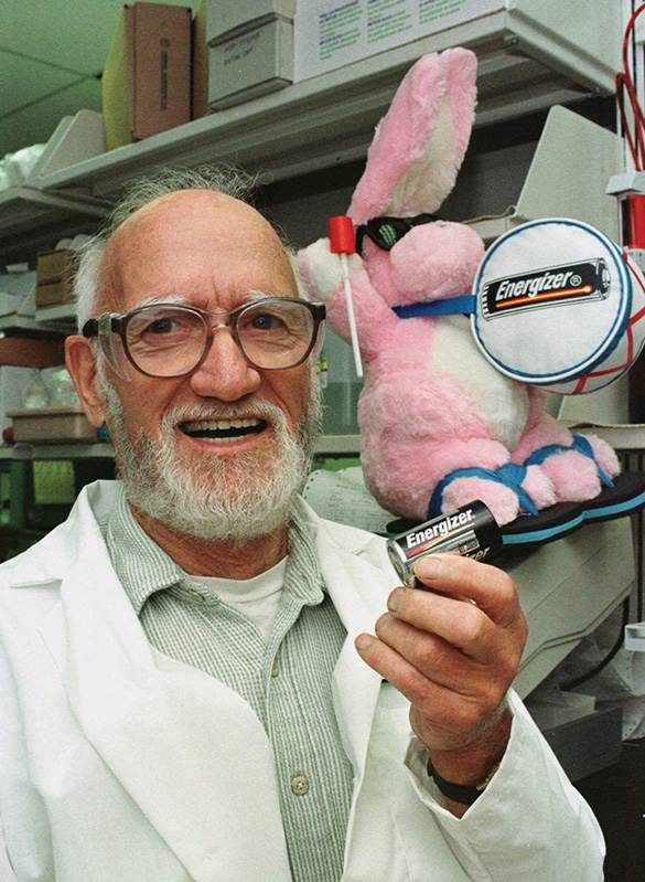 Lewis Urry Lewis Urry holding a battery with the Energizer Bunny behind him.
