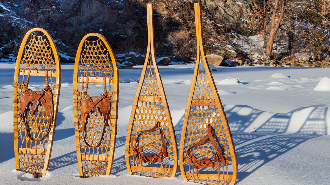 Traditional snowshoes made from wood and animal skin.