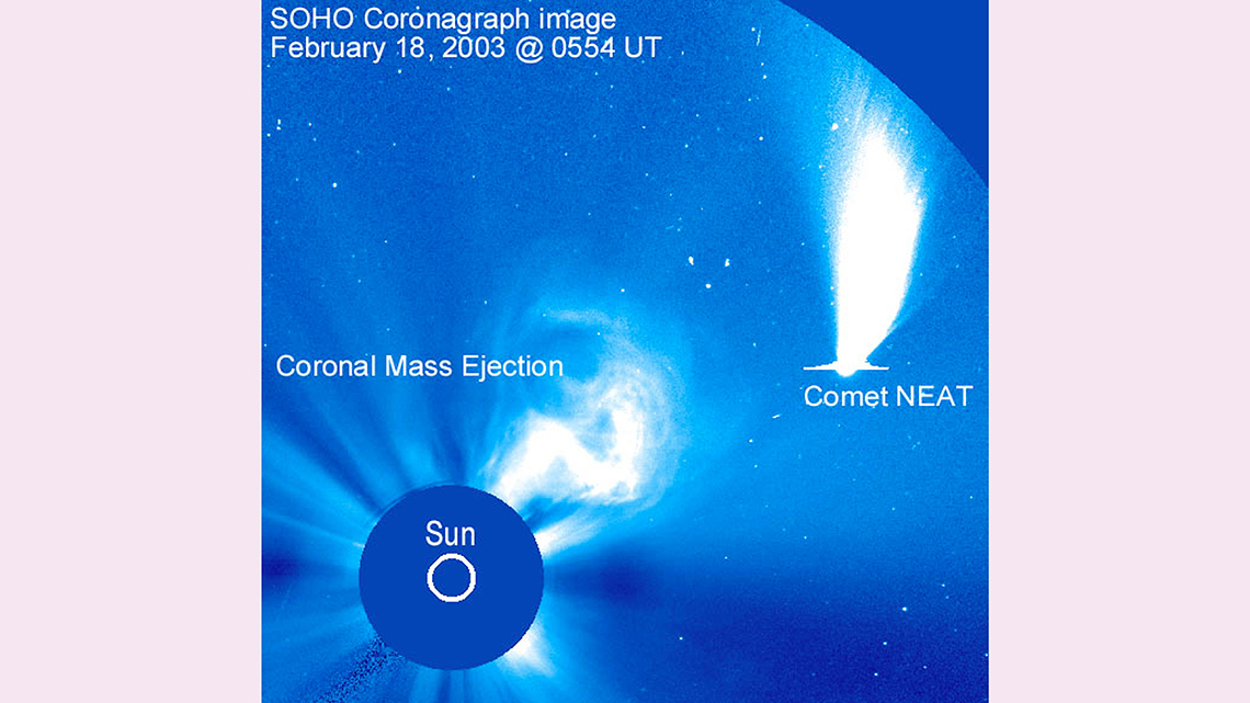 Streaking flashes of light in the night sky showing a comet.