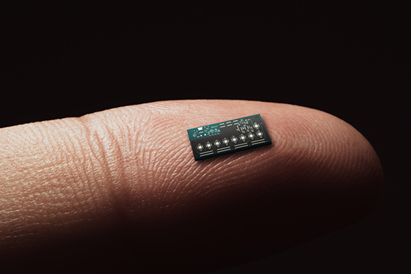 A tiny computer chip that fits on a person’s fingertip