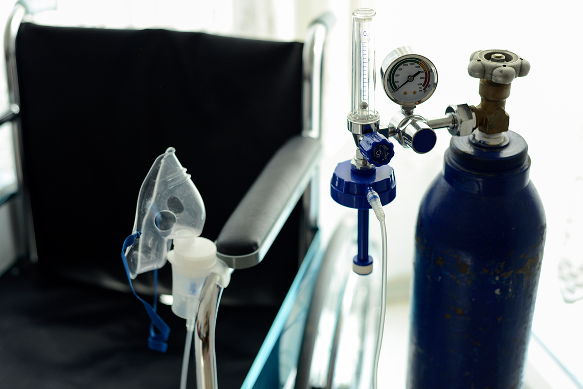 Portable oxygen tank.