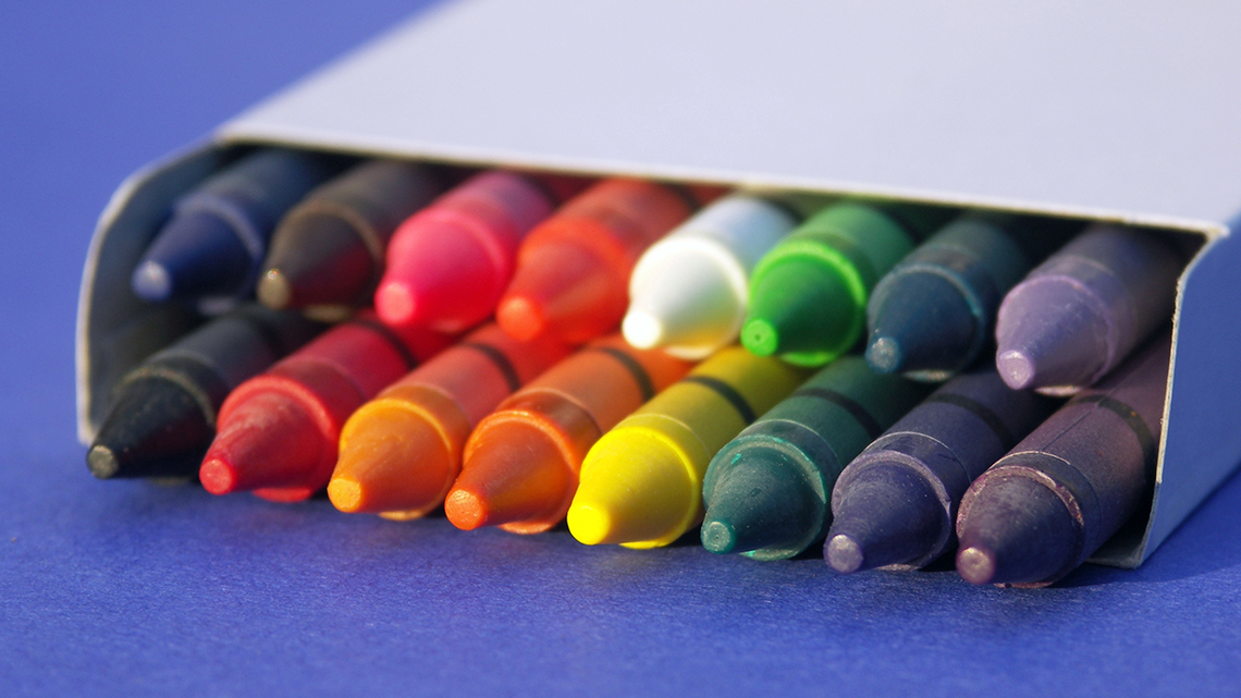 Crayons stacked together in a pack.