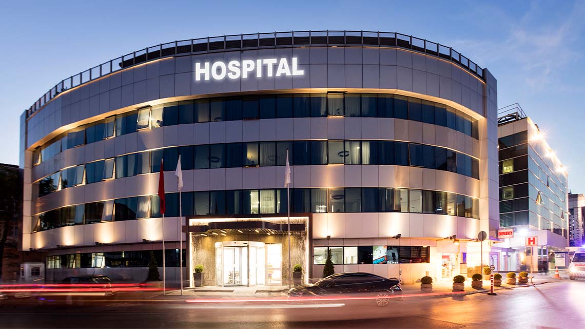 A large hospital building in a city.