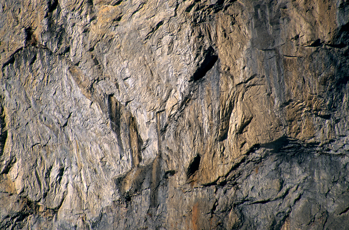 Igneous rock in nature. It is bumpy and rough.