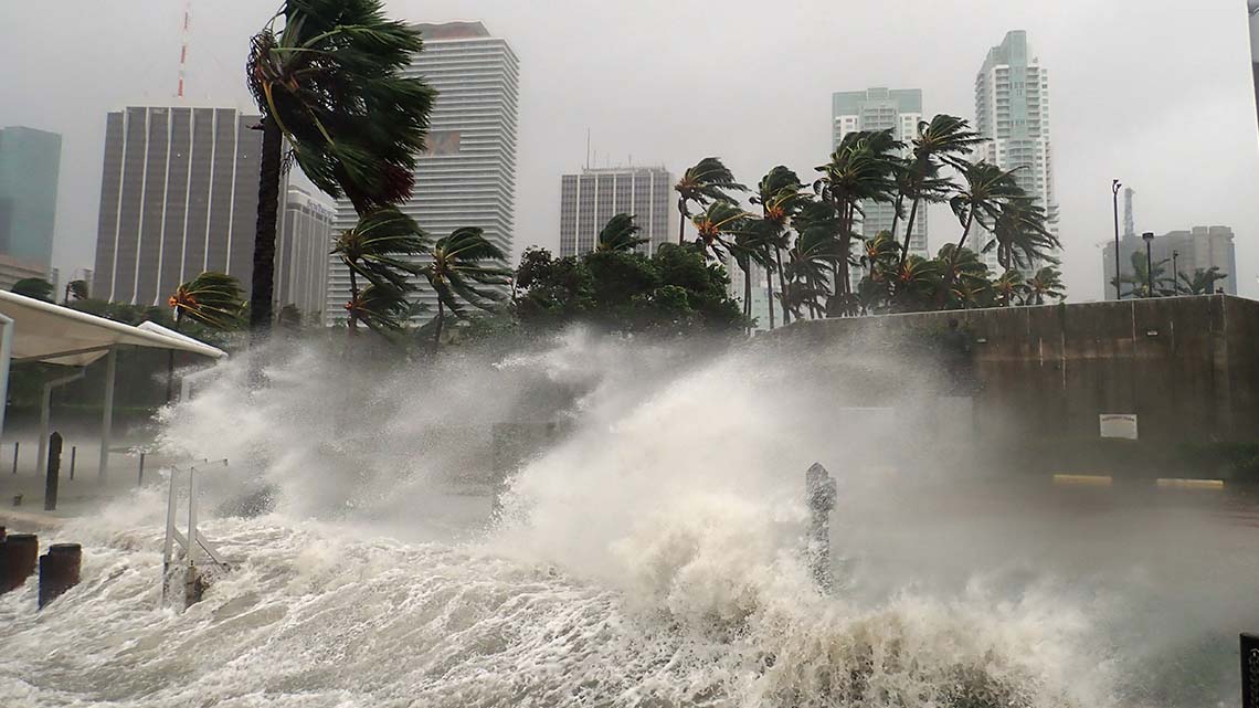 A hurricane striking a city.