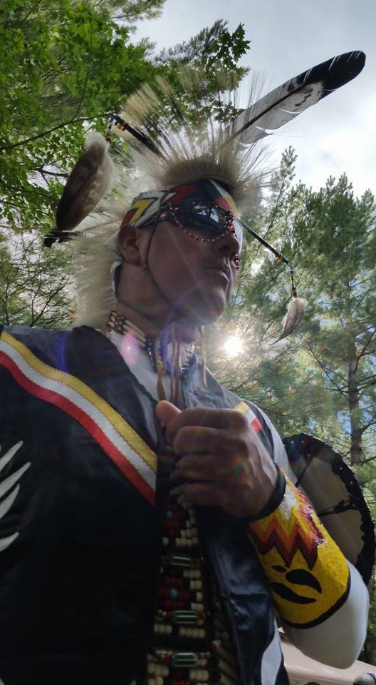 John Paul Kohoko of the Algonquins of Pikwakanagan and an employee of OPG wearing his First Nation’s traditional regalia.