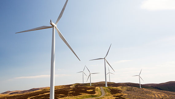 Wind turbine Six wind turbines in a field.