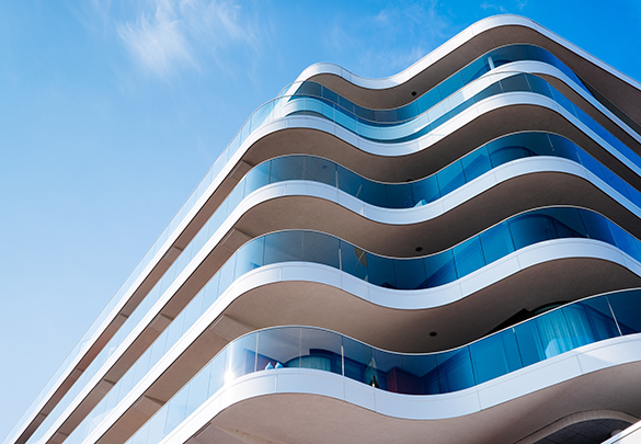 A building with curved, wavy balconies.