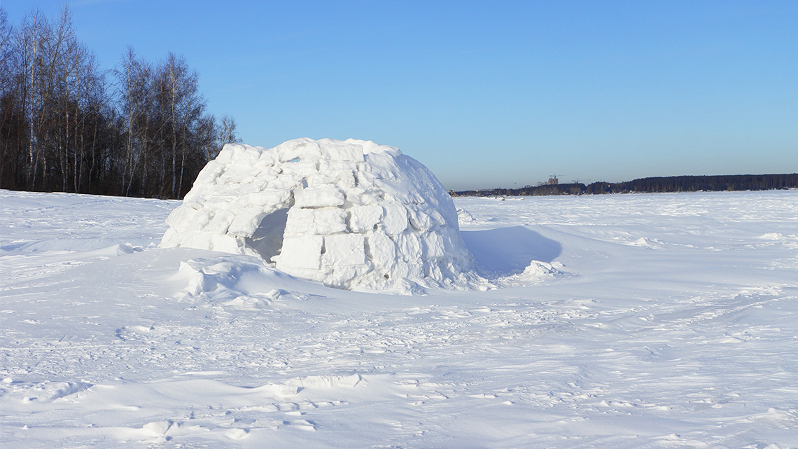 Round, white igloo hotel in snowy parts of Ontario.