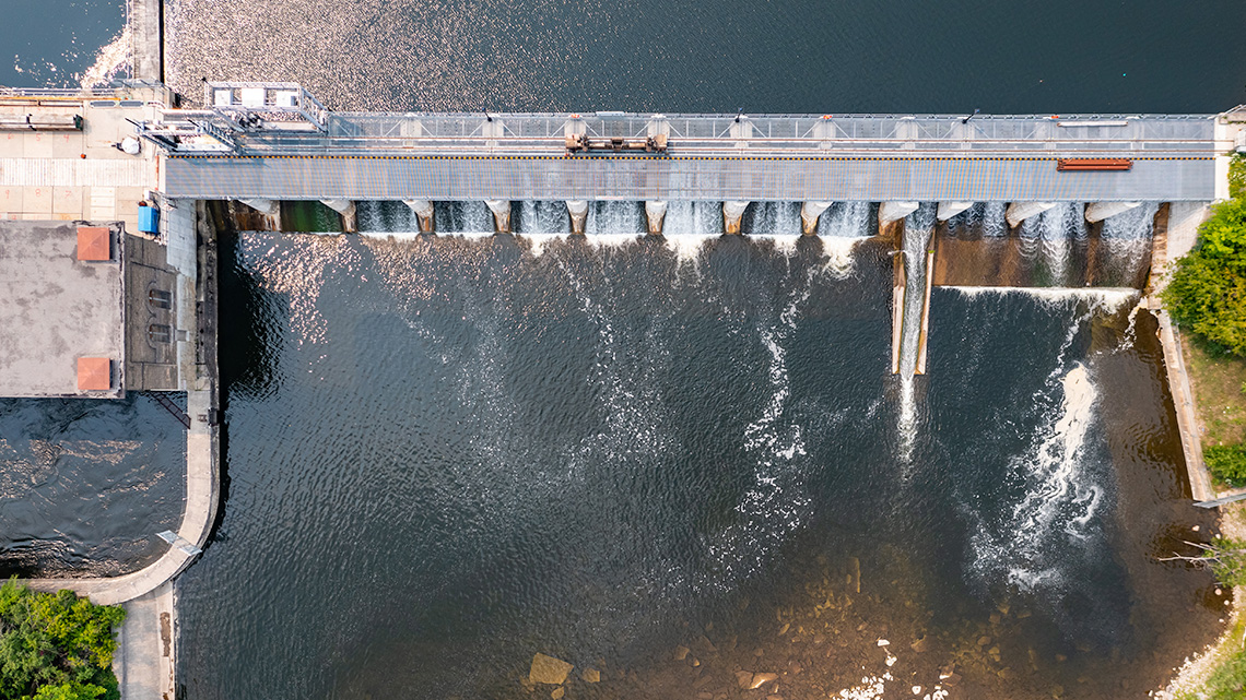Aerial view of the Otonabee river with bridge in the middle.