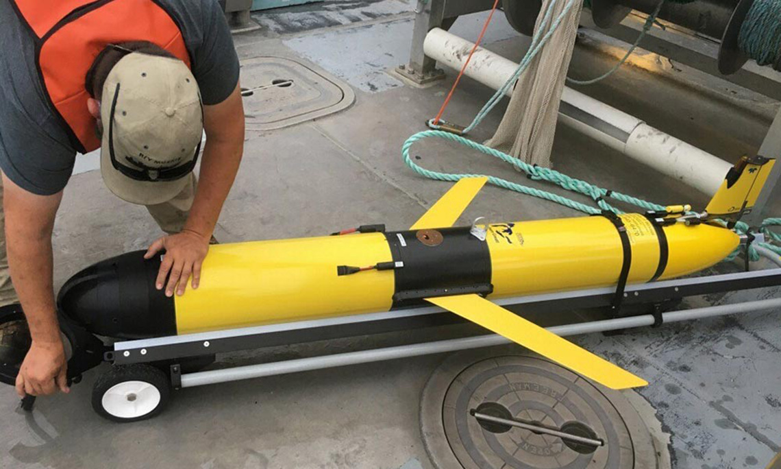 A person working on a glider