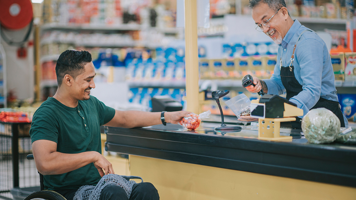 A grocery store worker asking for a price check.