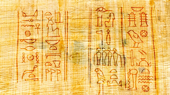 Ancient papyrus with inscriptions known as Egyptian hieroglyphs.