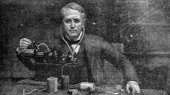 Photo of Thomas Edison with the invention of the phonograph.