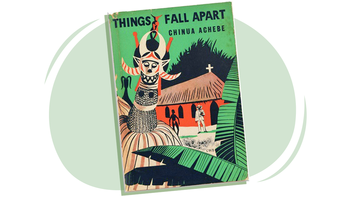A book, Things Fall Apart. On the cover are 2 men standing in front of a church in the jungle.