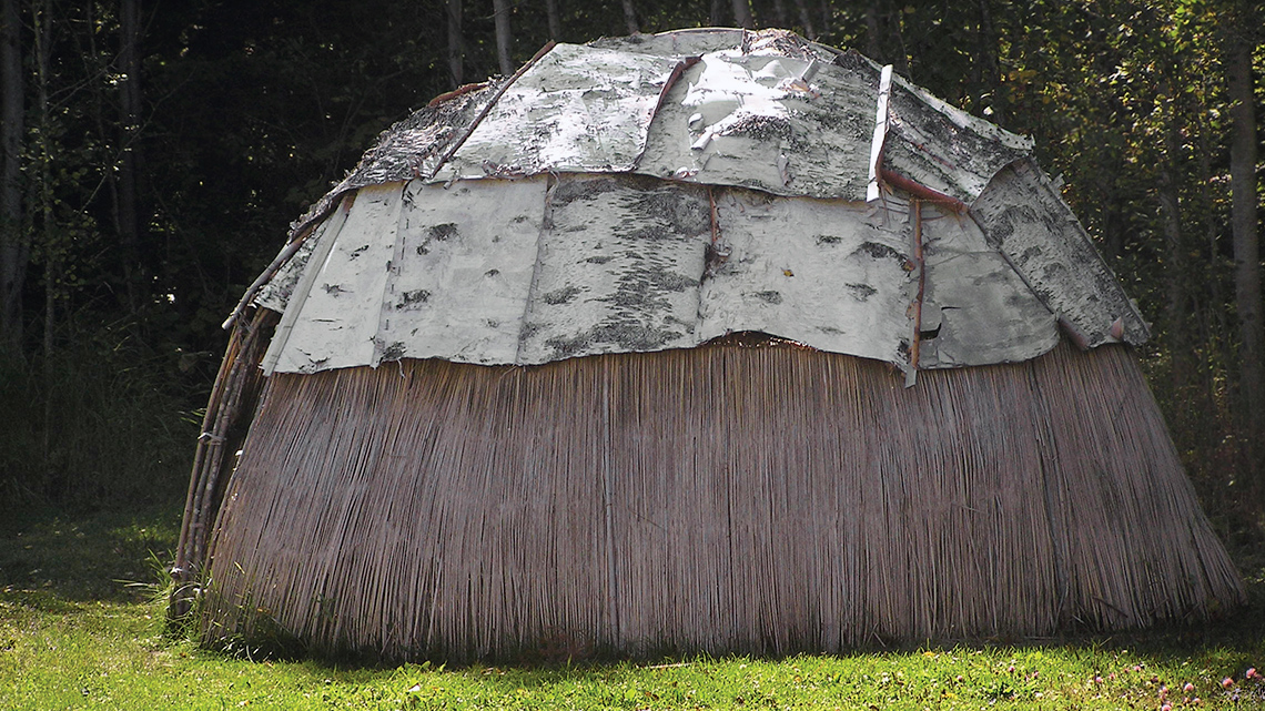 Wigwam Ojibwa wigwam (domed shape tent) made of birchbark and wood.
