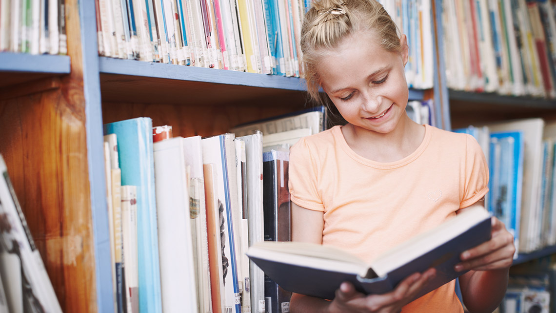 A Librarian, holding books.